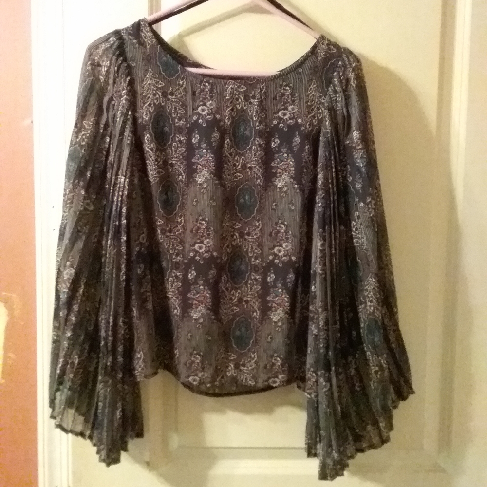 Beautiful blues, pink etc. Flutter sleeves blouse